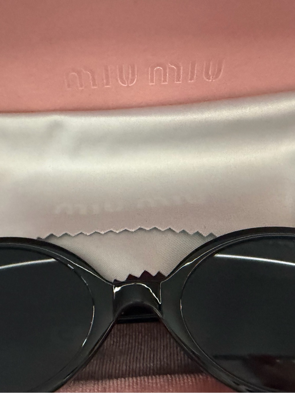 Miu Miu Black Oval Sunglasses